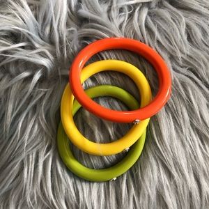 Henri Bendel color bangles logo on each bracelet